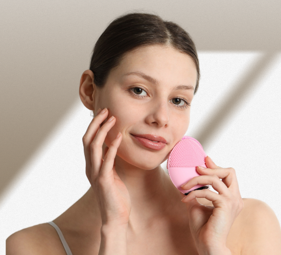 A woman using a Silicone Electric Facial Cleansing Brush on her face, massaging and exfoliating for a refreshed, radiant complexion.