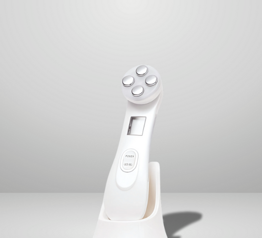 At-home EMS skincare device for facial tightening and enhanced serum absorption
